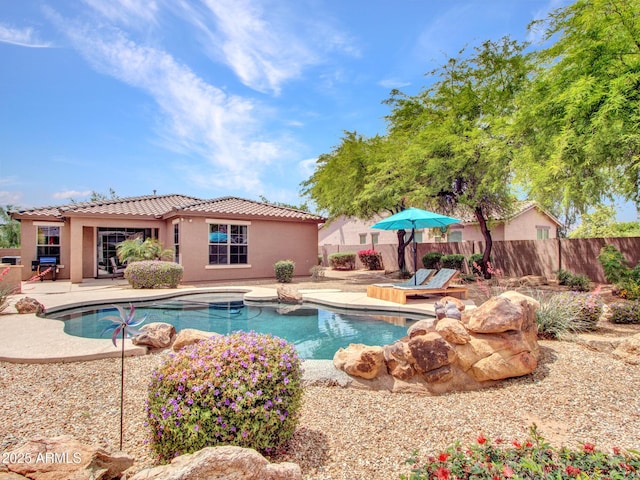 view of pool featuring a patio area, a fenced in pool, and fence