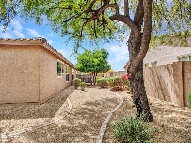 view of yard featuring a fenced backyard