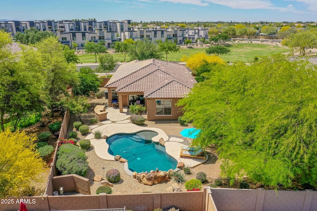 view of pool featuring a fenced backyard, a patio area, and a fenced in pool