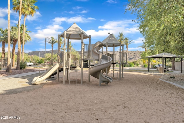 community play area featuring a mountain view