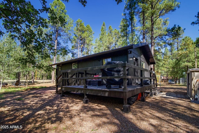 back of property with a deck