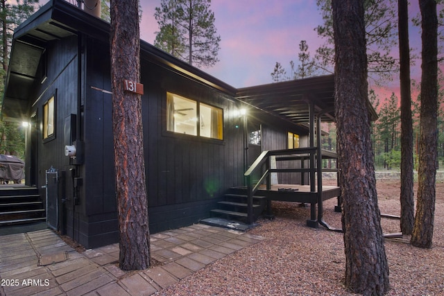 view of property exterior at dusk