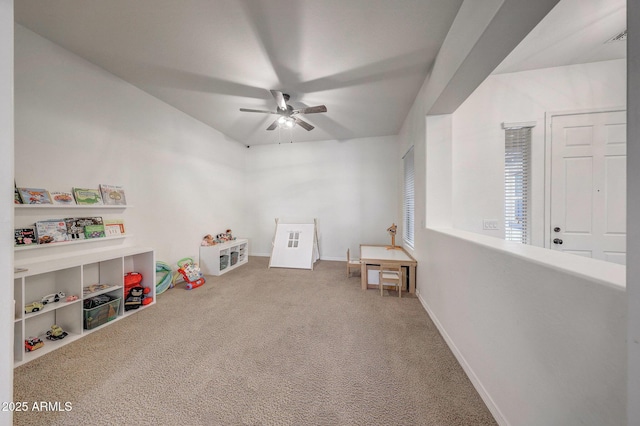 game room featuring carpet floors, ceiling fan, and baseboards