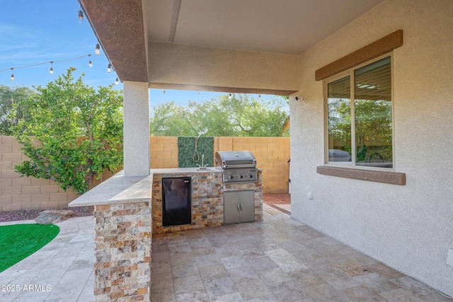 view of patio / terrace featuring a fenced backyard and area for grilling