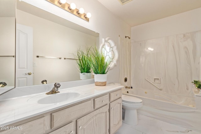 bathroom featuring vanity, toilet, and shower / bath combination