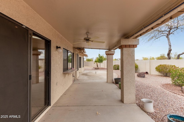 view of patio / terrace featuring a fenced backyard and ceiling fan