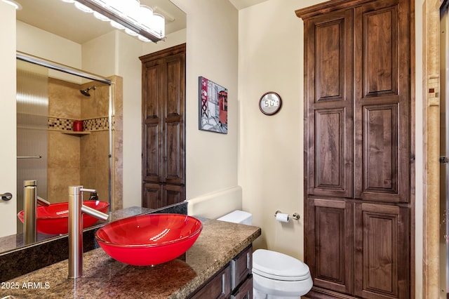 full bath with vanity and toilet