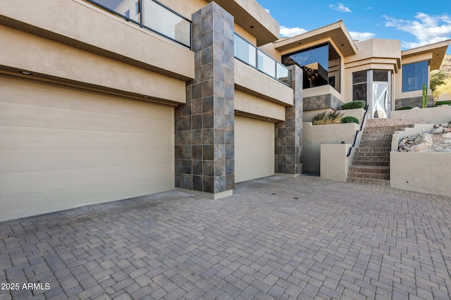 exterior space with decorative driveway