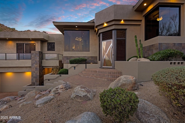 view of front of house with stucco siding