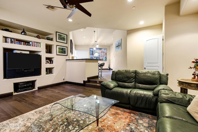 living area featuring ceiling fan, dark wood-type flooring, visible vents, and recessed lighting