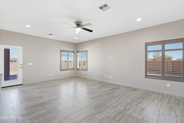 empty room featuring ceiling fan