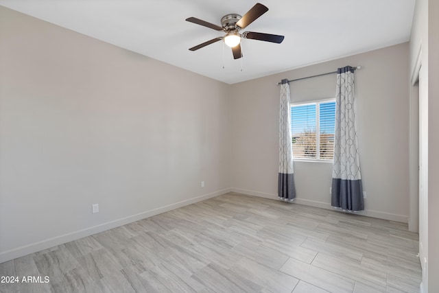 empty room featuring ceiling fan