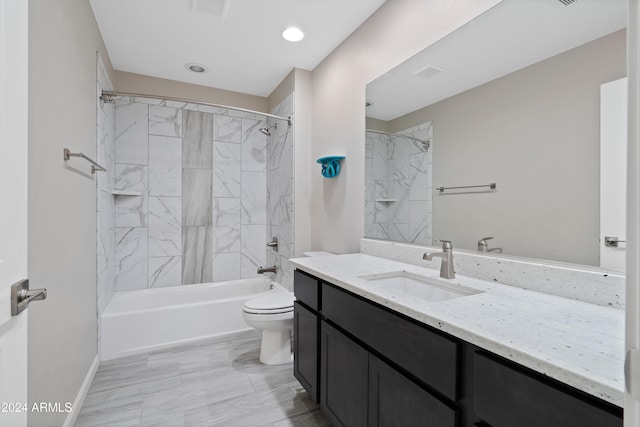 full bathroom with vanity, toilet, and tiled shower / bath combo