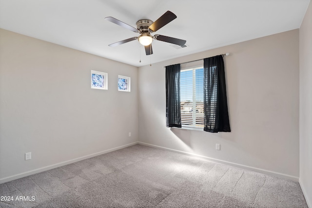 carpeted empty room with ceiling fan