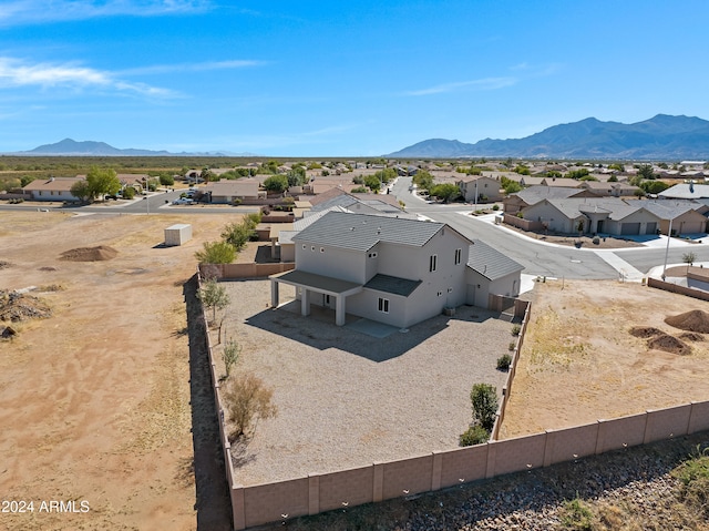 drone / aerial view featuring a mountain view