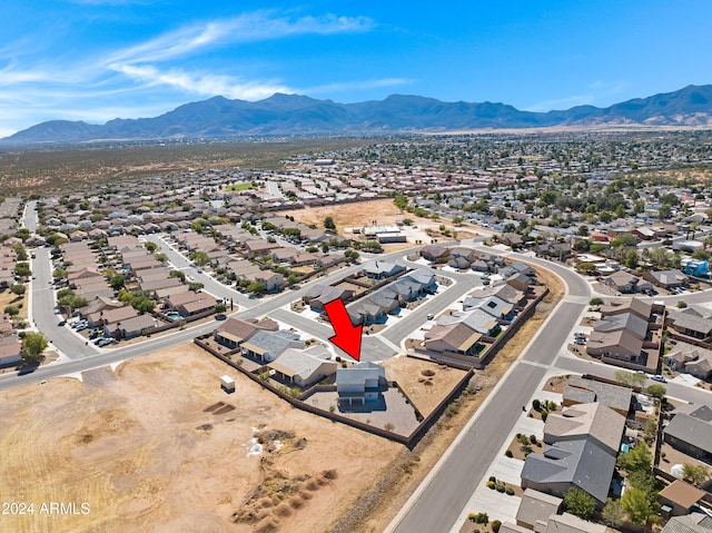 drone / aerial view featuring a mountain view