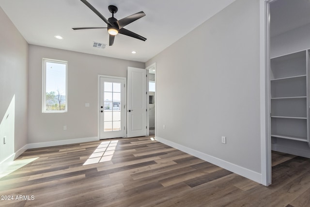 entryway featuring ceiling fan and dark hardwood / wood-style flooring