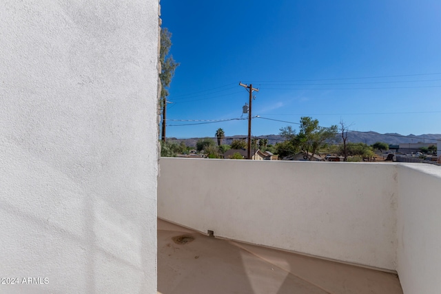 balcony featuring a mountain view