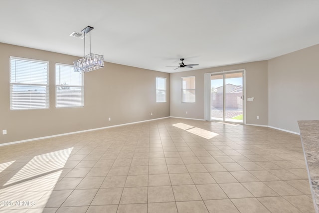 7580 W Darrel Rd, Laveen, AZ 85339 - empty room featuring a ceiling fan, light tile patterned floors, and baseboards