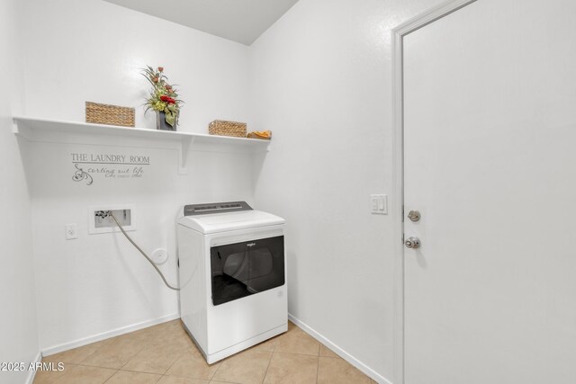 7580 W Darrel Rd, Laveen, AZ 85339 - laundry area with washer / clothes dryer, light tile patterned floors, and baseboards