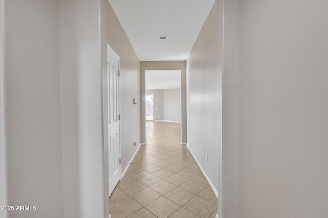 7580 W Darrel Rd, Laveen, AZ 85339 - hallway featuring light tile patterned floors and baseboards