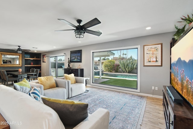 8730 E Montecito Ave, Scottsdale, AZ 85251 - living room with baseboards, ceiling fan, recessed lighting, and light wood-style flooring