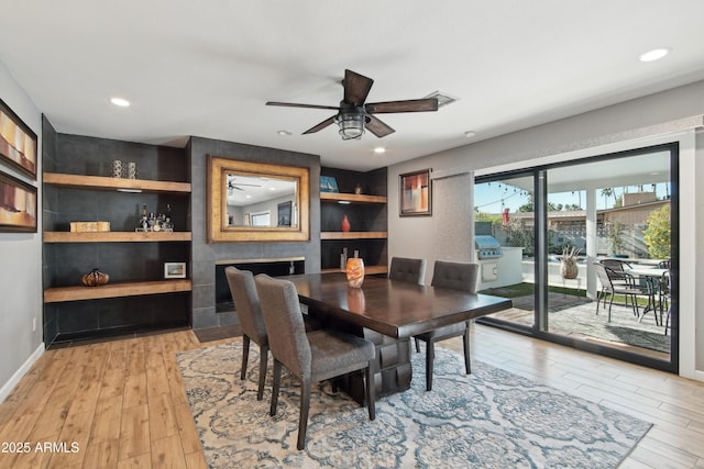 8730 E Montecito Ave, Scottsdale, AZ 85251 - dining area with ceiling fan, built in features, baseboards, recessed lighting, and light wood-style flooring