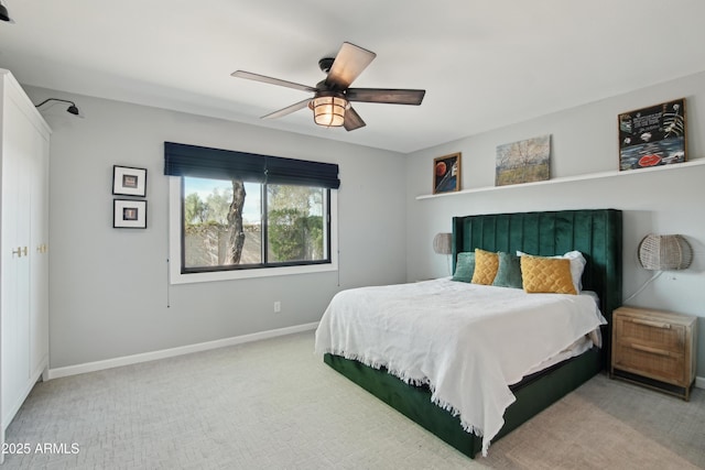 8730 E Montecito Ave, Scottsdale, AZ 85251 - bedroom with baseboards, carpet flooring, and a ceiling fan