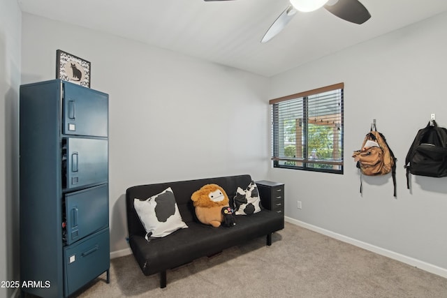 8730 E Montecito Ave, Scottsdale, AZ 85251 - living area with baseboards, light carpet, and a ceiling fan