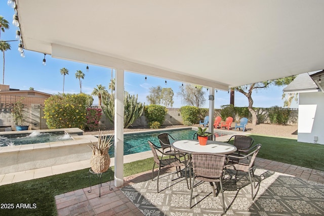 8730 E Montecito Ave, Scottsdale, AZ 85251 - view of patio / terrace with an in ground hot tub, a fenced in pool, outdoor dining area, and a fenced backyard