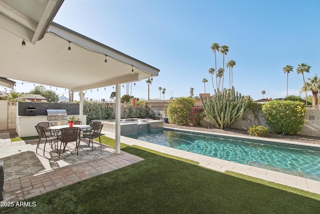 8730 E Montecito Ave, Scottsdale, AZ 85251 - view of pool featuring an outdoor kitchen, area for grilling, a fenced backyard, a patio area, and a yard