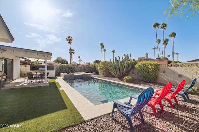 8730 E Montecito Ave, Scottsdale, AZ 85251 - view of swimming pool with a yard, a patio, a pool with connected hot tub, and a fenced backyard