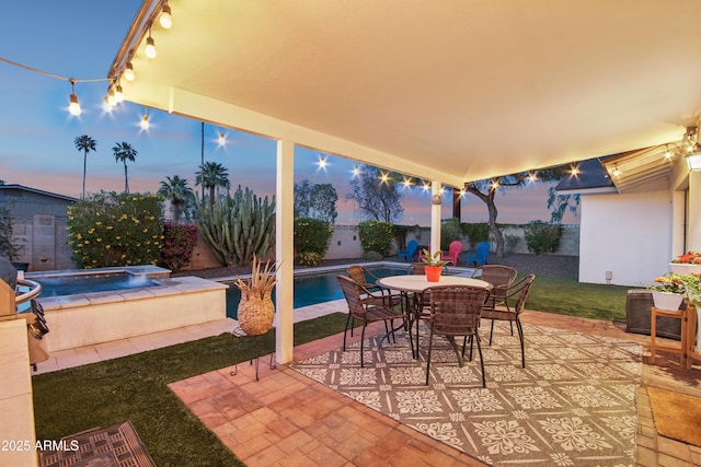 8730 E Montecito Ave, Scottsdale, AZ 85251 - view of patio featuring an in ground hot tub, outdoor dining area, an outdoor pool, and a fenced backyard