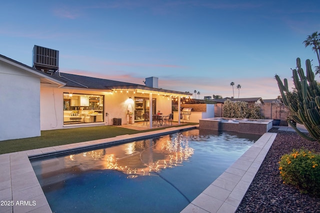 8730 E Montecito Ave, Scottsdale, AZ 85251 - outdoor pool with fence, central AC, area for grilling, an in ground hot tub, and a patio