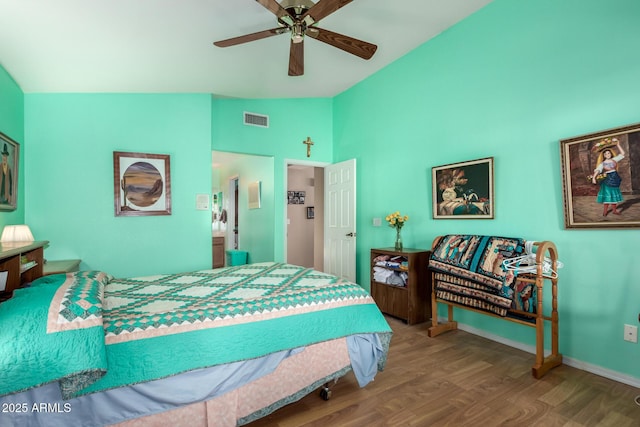 bedroom featuring lofted ceiling, hardwood / wood-style floors, and ceiling fan