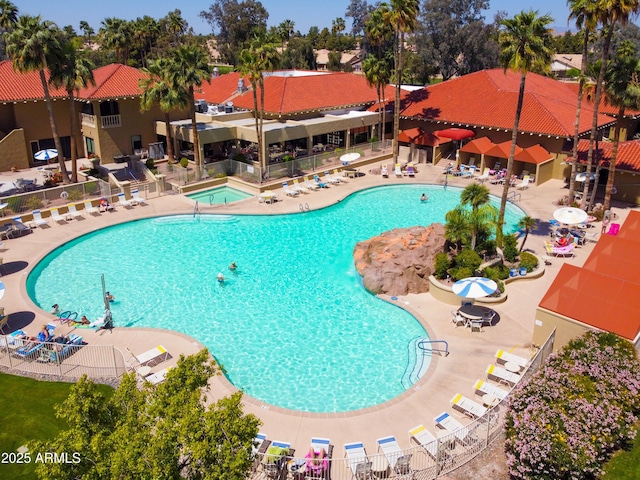 view of swimming pool with a patio area