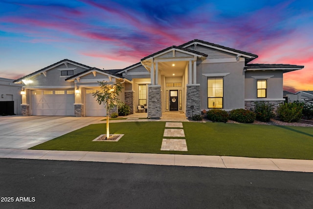 20716 E Pummelos Rd, Queen Creek, AZ 85142 - craftsman-style home featuring stone siding, concrete driveway, stucco siding, and an attached garage
