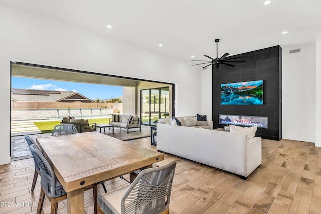 20716 E Pummelos Rd, Queen Creek, AZ 85142 - living room with light wood-style floors, recessed lighting, and a ceiling fan