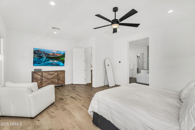 20716 E Pummelos Rd, Queen Creek, AZ 85142 - bedroom with recessed lighting, light wood-style floors, ensuite bath, and ceiling fan