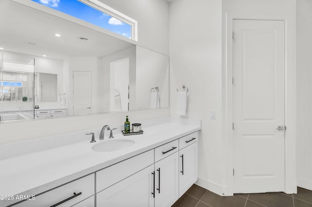 20716 E Pummelos Rd, Queen Creek, AZ 85142 - bathroom featuring tile patterned flooring, vanity, and recessed lighting