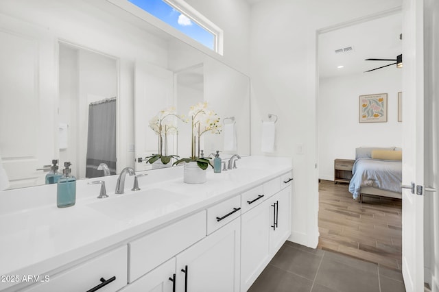 20716 E Pummelos Rd, Queen Creek, AZ 85142 - ensuite bathroom featuring double vanity and tile patterned flooring
