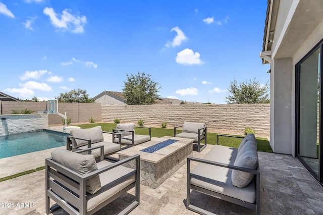 20716 E Pummelos Rd, Queen Creek, AZ 85142 - fenced backyard with an outdoor living space with a fire pit and a patio