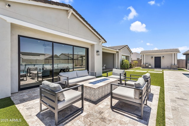 20716 E Pummelos Rd, Queen Creek, AZ 85142 - view of patio / terrace with an outdoor living space with a fire pit and an outdoor structure