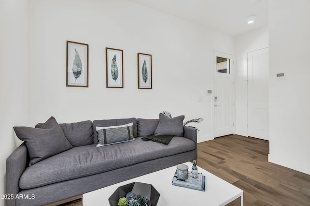 20716 E Pummelos Rd, Queen Creek, AZ 85142 - living area featuring wood finished floors and baseboards