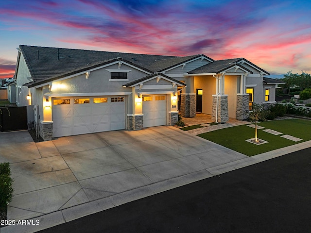 20716 E Pummelos Rd, Queen Creek, AZ 85142 - view of front of property with stone siding, stucco siding, driveway, and an attached garage