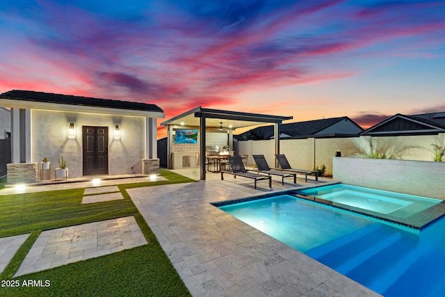 20716 E Pummelos Rd, Queen Creek, AZ 85142 - pool at dusk with a patio, a ceiling fan, and a pool with connected hot tub