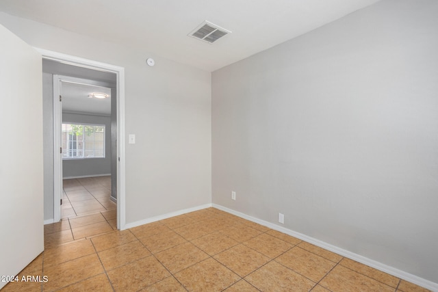 view of tiled spare room