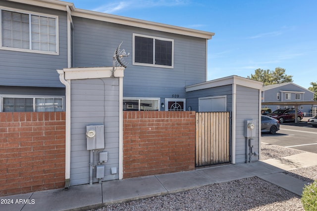 view of front facade with a carport