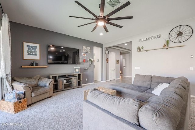 living room with carpet flooring and ceiling fan