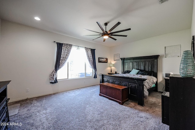 carpeted bedroom with ceiling fan